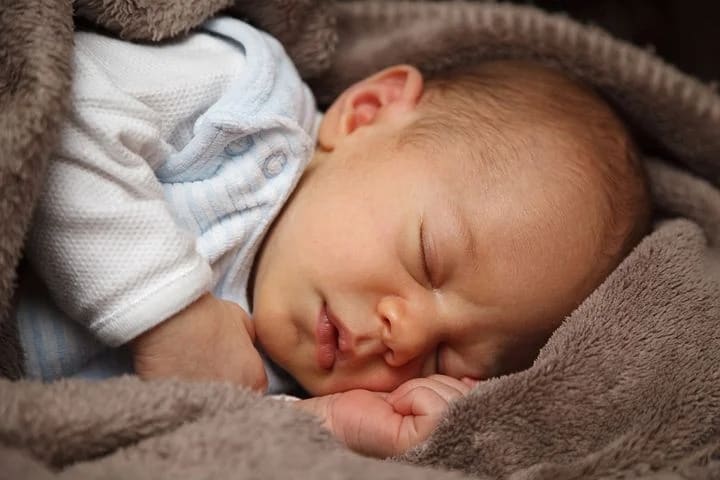 How Much Should A 2 Month Old Sleep