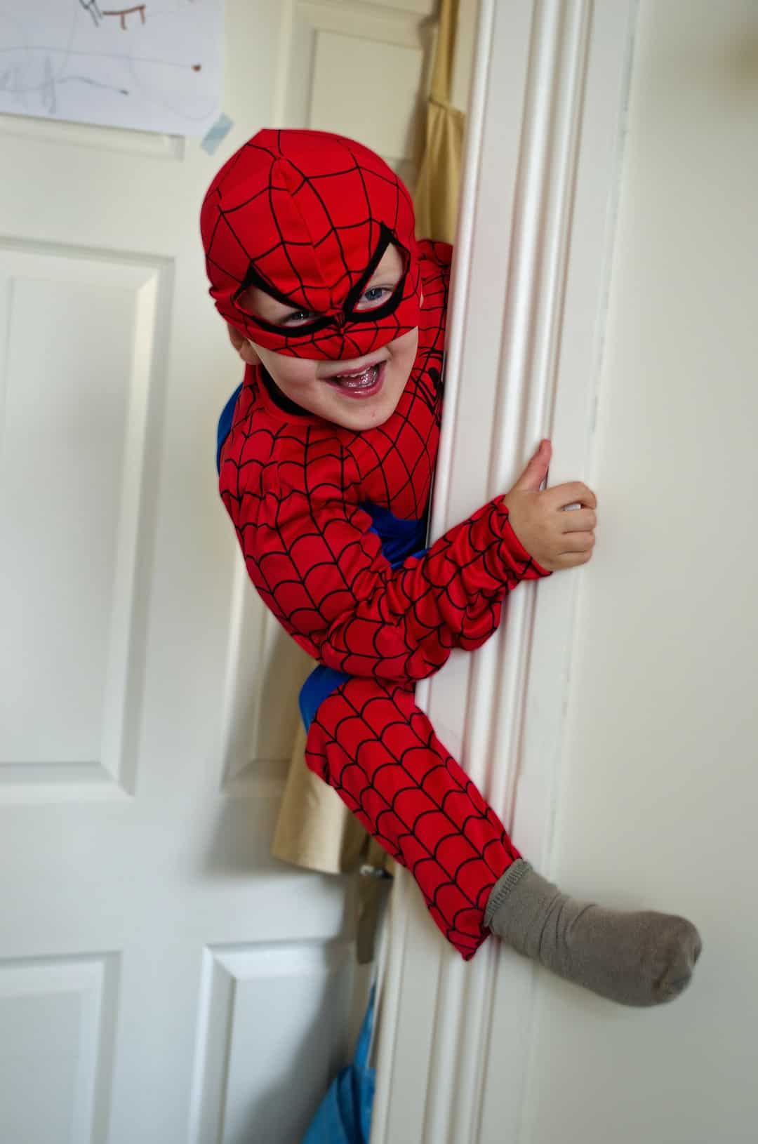 Child dressed like spiderman