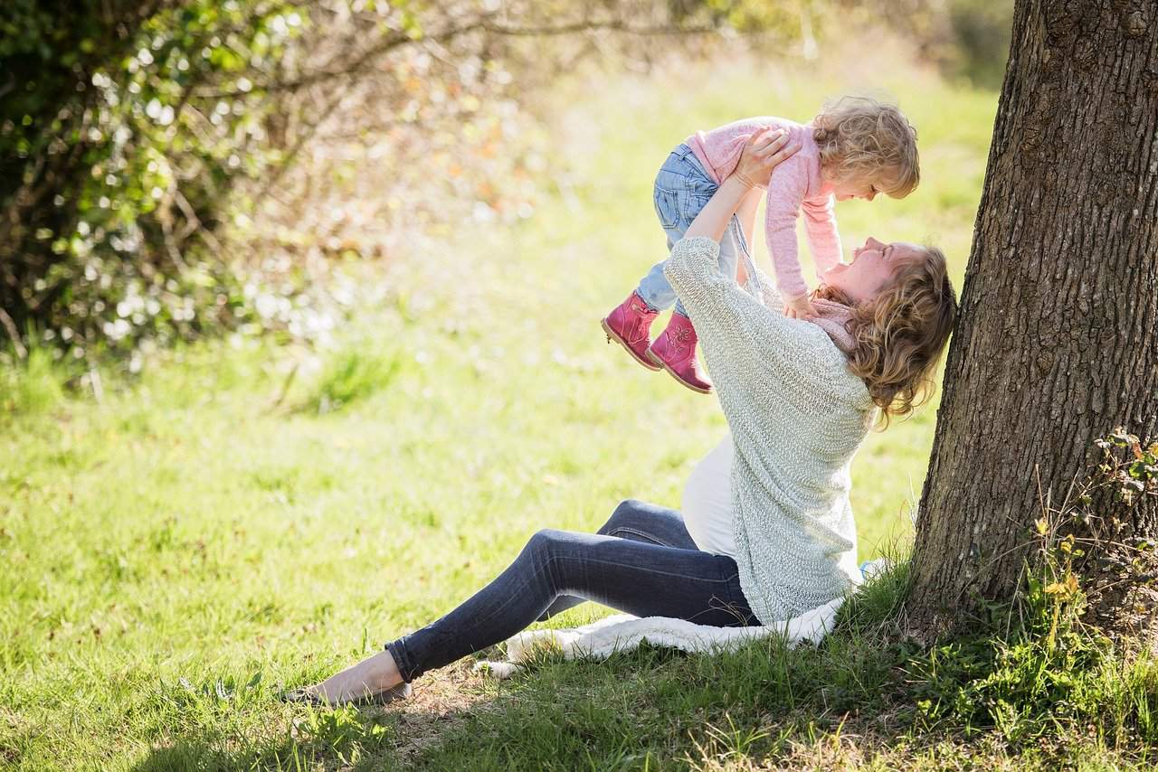 Mom and toddler playing