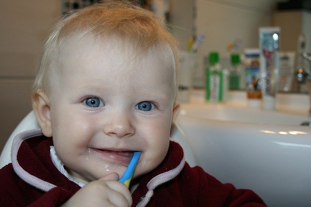 How to get a toddler to brush their teeth