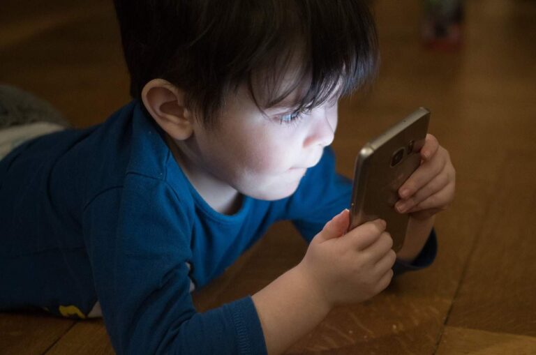 Child with cell phone