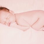 Why do babies sleep with their butts in the air