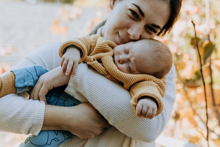 A mom holding her baby