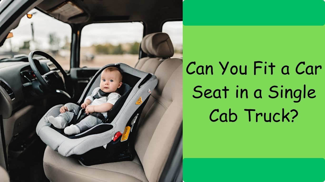 a baby in a car seat in a truck